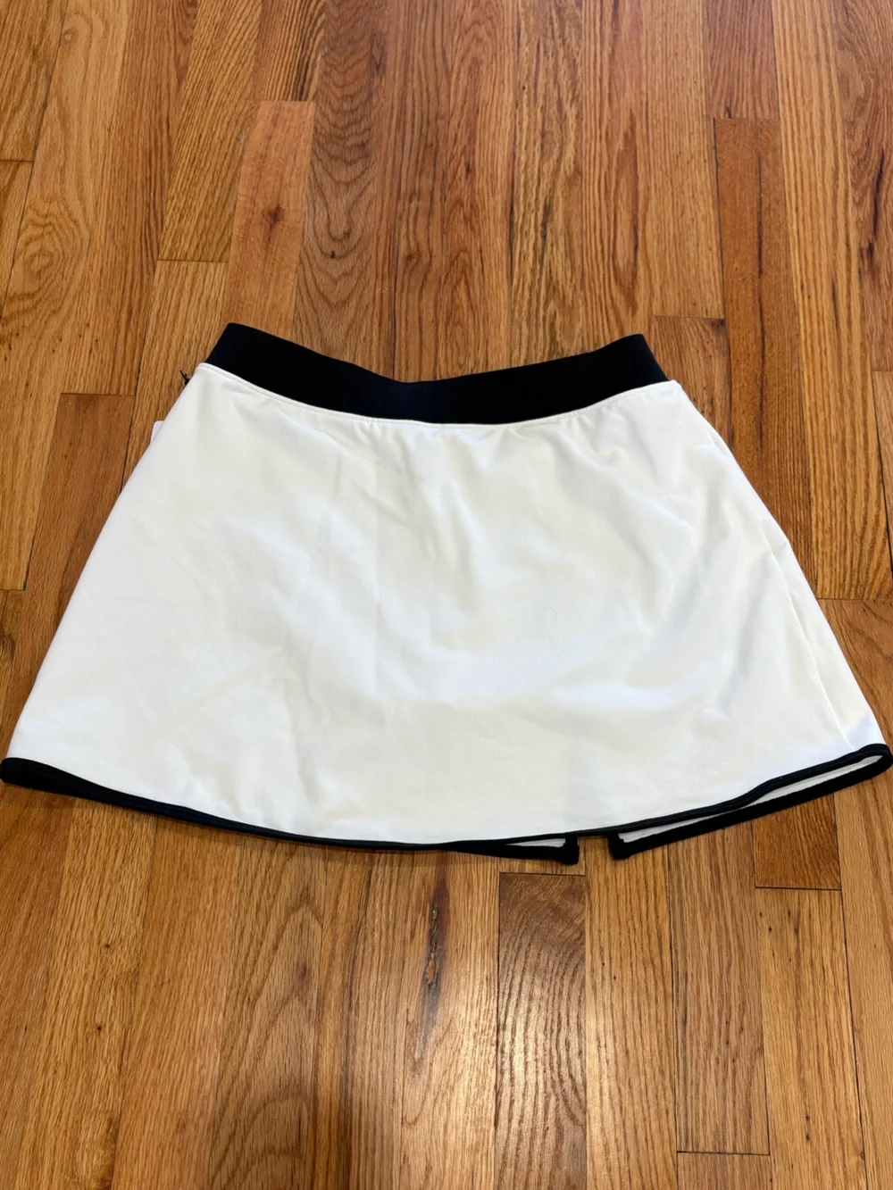 Alo white Crop Bustier Top with Black Trim with matching skirt